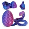 Serpent articulé violet iridescent et œuf de dragon impression 3D PLA Silk.