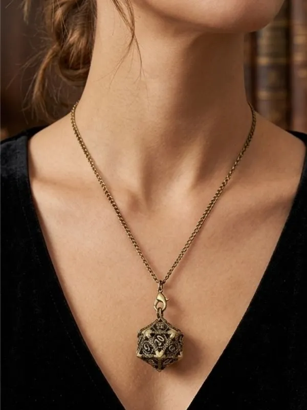 Alternative view of Porte-clés pendentif D20 creux bronze avec mini set de dés JDR