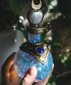 Alternative view of Fiole de potion magique "Larmes de Constellation" avec cristaux bleus - 15 cm