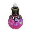 Fiole de potion magique décorative ronde de couleur rose avec paillettes irisées, bouchon orné d'un cristal de quartz et détails en métal vieilli, hauteur 15 cm.