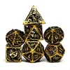 Set de 7 dés polyédriques métal dragon creux et or D&D.