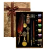 Coffret calligraphie vintage plumes, sceau cire dragon laiton, encres Mappe Monde.