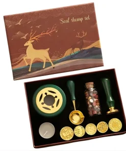 Coffret de luxe pour sceau à la cire comprenant un réchaud vert, une cuillère à fondre, un flacon de perles de cire multicolores, une bougie chauffe-plat et cinq têtes de tampons gravées.