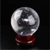 Boule de Cristal Céleste transparente aux reflets étoilés