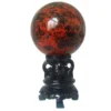 Boule de Cristal Dragon de Feu en obsidienne acajou rouge et noire, polie, sur socle.