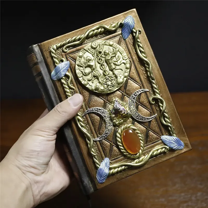 Grimoire Magique les Trois Lunes bronze.